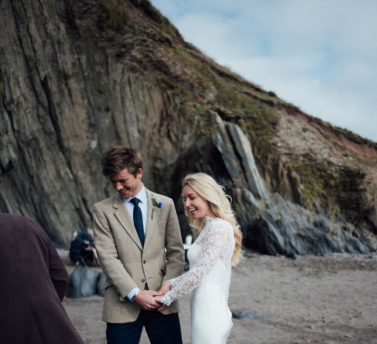 Intimate Beach Elopement In Devon With Bride In Bespoke Dress & Images By Liberty Pearl Photography