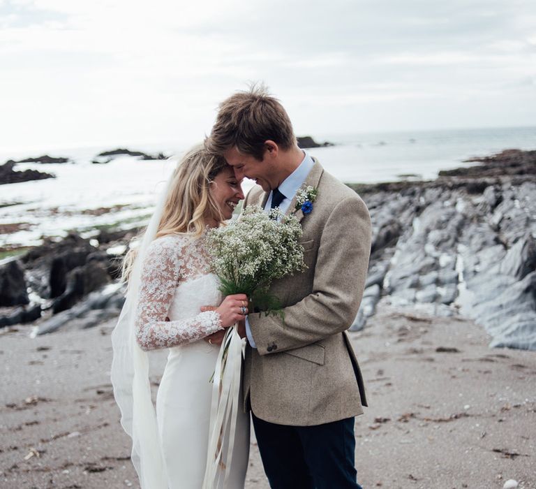 Intimate Beach Elopement In Devon With Bride In Bespoke Dress & Images By Liberty Pearl Photography