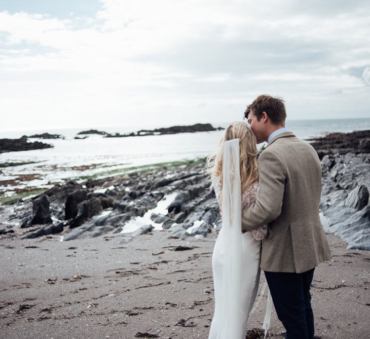 Intimate Beach Elopement In Devon With Bride In Bespoke Dress & Images By Liberty Pearl Photography