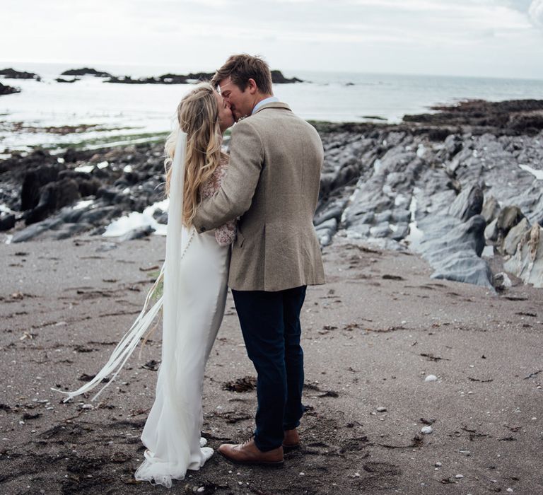 Intimate Beach Elopement In Devon With Bride In Bespoke Dress & Images By Liberty Pearl Photography