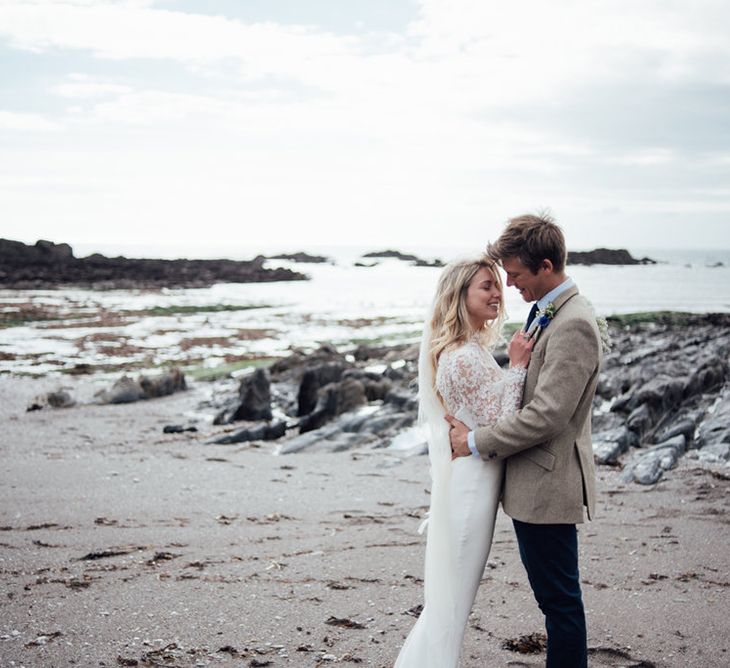 Intimate Beach Elopement In Devon With Bride In Bespoke Dress & Images By Liberty Pearl Photography