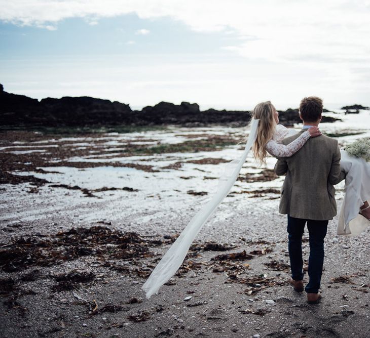 Intimate Beach Elopement In Devon With Bride In Bespoke Dress & Images By Liberty Pearl Photography