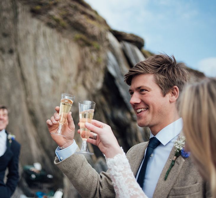 Intimate Beach Elopement In Devon With Bride In Bespoke Dress & Images By Liberty Pearl Photography