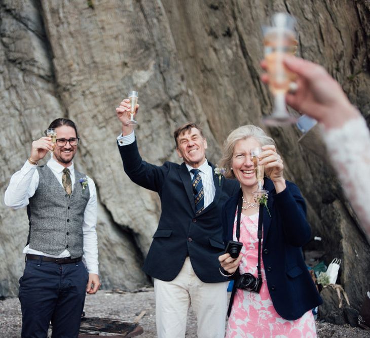 Intimate Beach Elopement In Devon With Bride In Bespoke Dress & Images By Liberty Pearl Photography