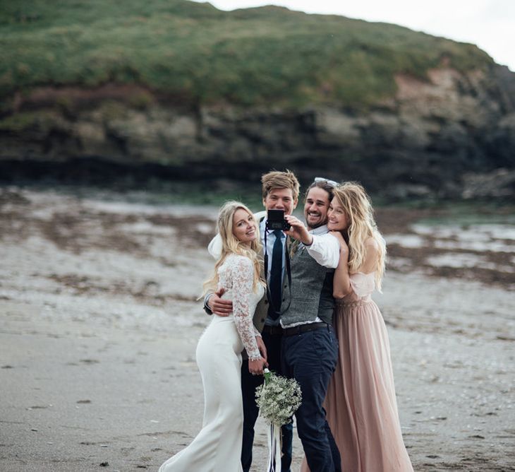 Intimate Beach Elopement In Devon With Bride In Bespoke Dress & Images By Liberty Pearl Photography