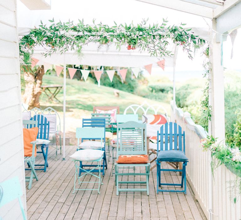 Veranda with Deck Chairs & Floral Garland