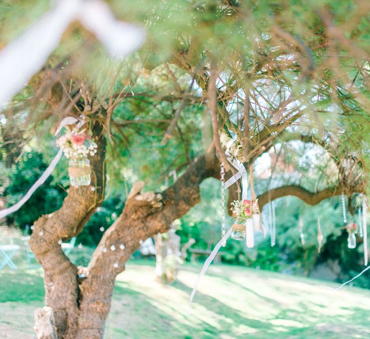 Hanging Bottles & Ribbon in the Tree