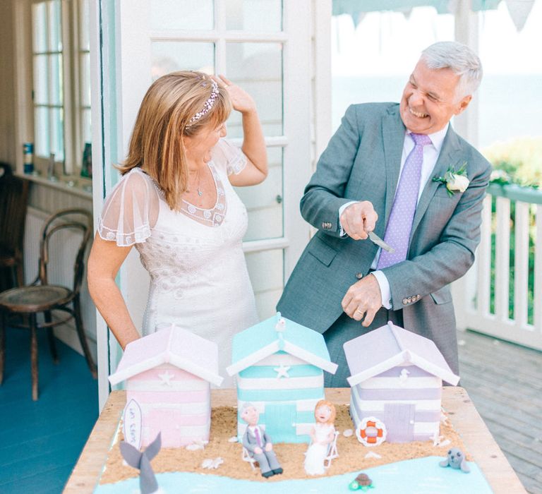 Bride & Groom Cutting the Cake