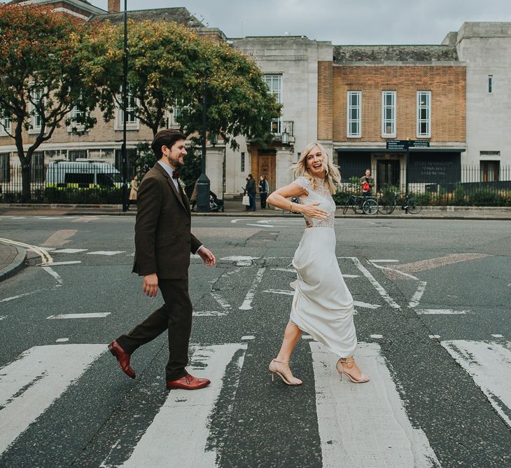 Urban Portraits Bride in Anais Anette Savannah Bridal Gown & Groom in Walker Slater Tweed Suit