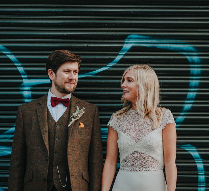 Urban Portraits with Bride in Anais Anette Savannah Bridal Gown & Groom in Walker Slater Tweed Suit