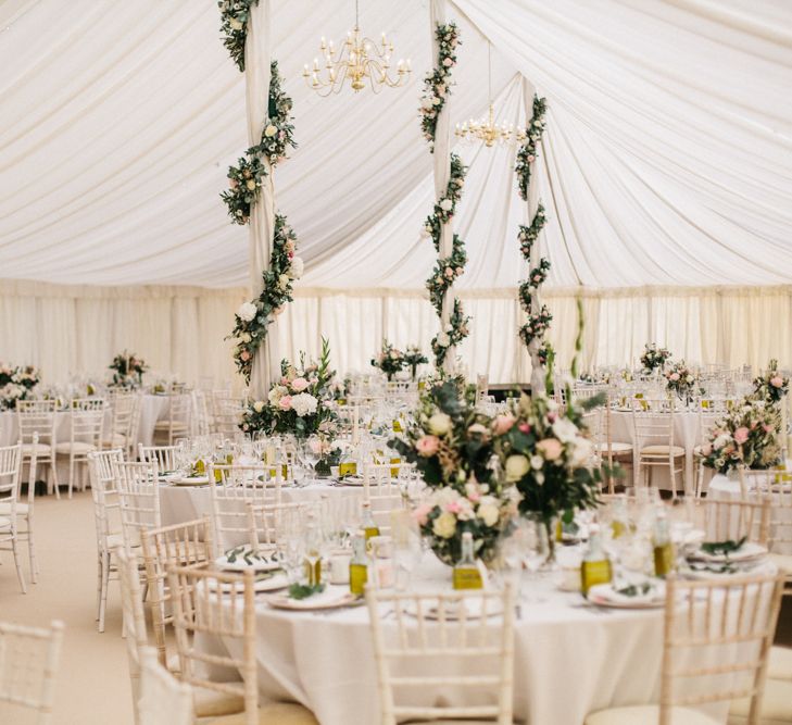 Marquee Poles With Floral Decor