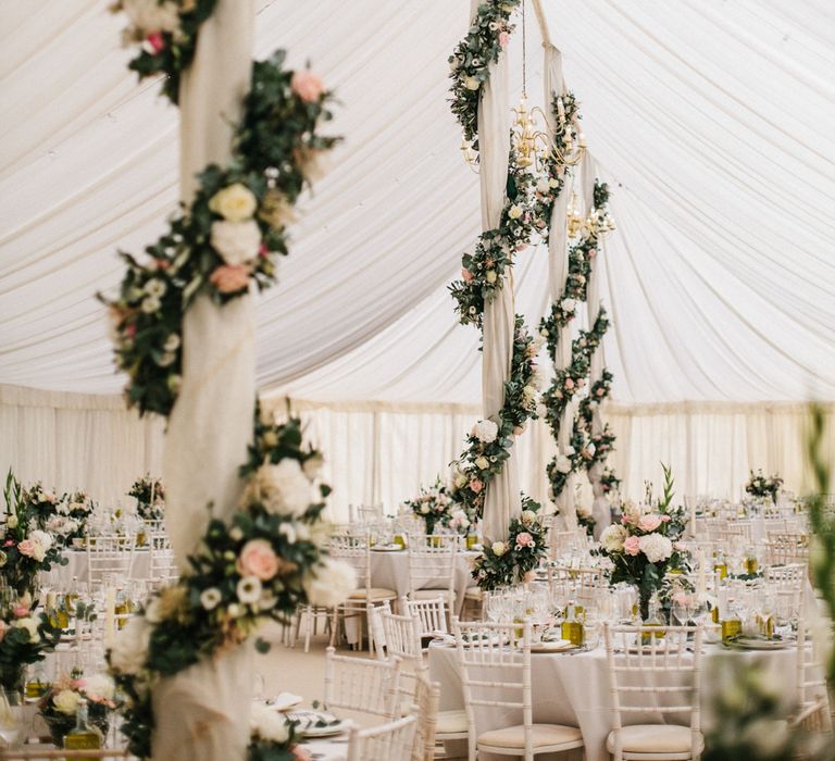 Marquee Poles With Floral Decor