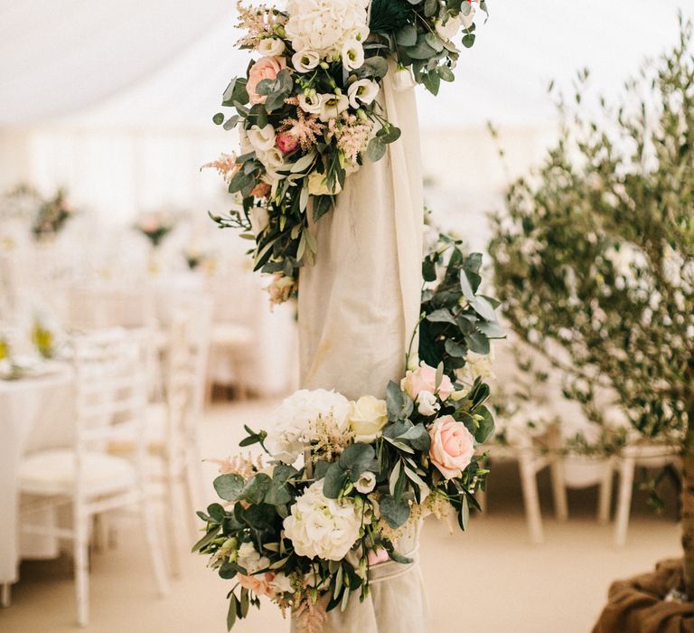 Marquee Poles With Floral Decor