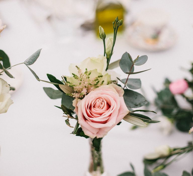 Roses In Bud Vases