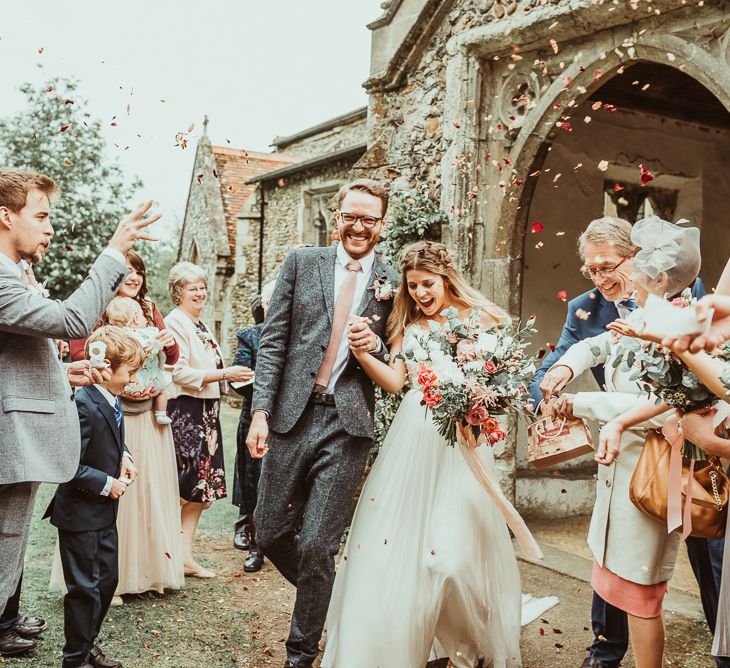 Confetti Moment | Bride in Catherine Deane Separates | Groom in Reiss Suit | DIY At Home Marquee Reception | Jess Soper Photography