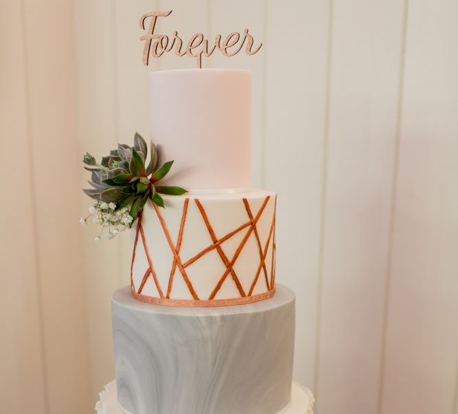 Elegant Wedding Cake With Grey & Gold Icing