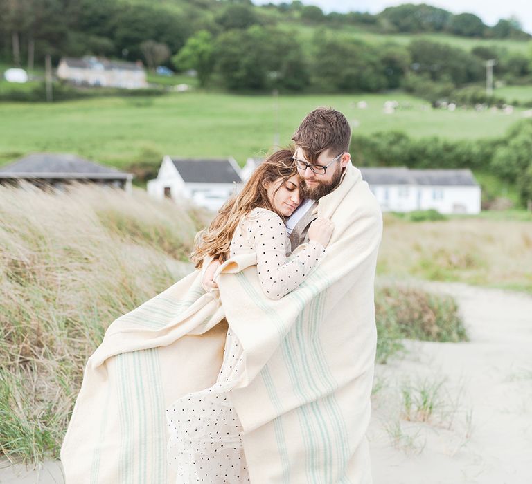 Coastal Elopement Shoot On The Beach With Bride In Polka Dot Dress & Felt Hat With Images By Emma Pilkington Fine Art Wedding Photographer