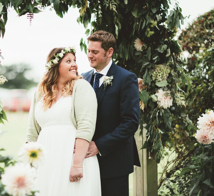 Floral Arch | Bride in Something Old Something New Bridal Gown | Groom in Marks and Spencer Suit | Maryanne Weddings Photography