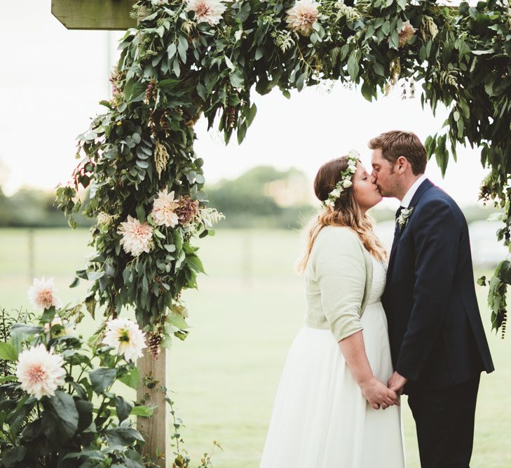 Floral Arch | Bride in Something Old Something New Bridal Gown | Groom in Marks and Spencer Suit | Maryanne Weddings Photography