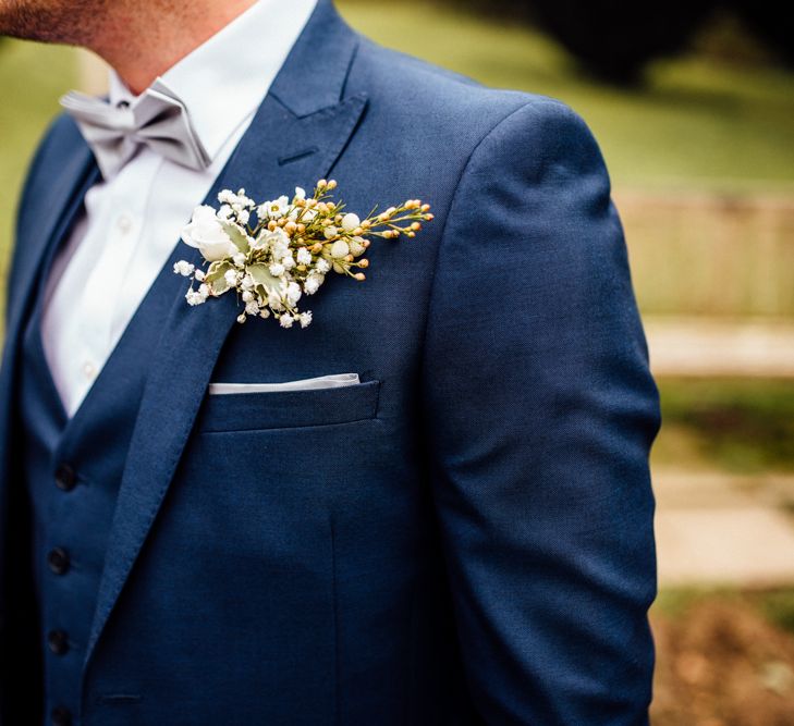 Buttonhole | Groom in Blue Moss Bros Suit | Michelle Wood Photography