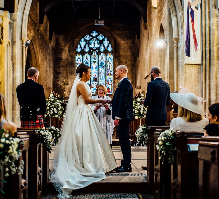 Church Wedding Ceremony | Bride in Pronovias Tami Wedding Dress | Groom in Blue Moss Bros Suit | Michelle Wood Photography