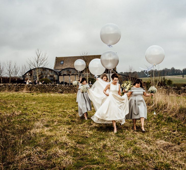 Giant Balloons | Bridesmaids in Grey ASOS High Low Bardot Dresses | Bride in Pronovias Tami Wedding Dress | Michelle Wood Photography