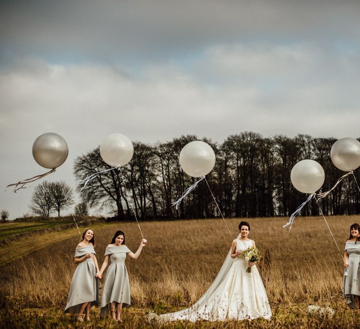 Giant Balloons | Bridesmaids in Grey ASOS High Low Bardot Dresses | Bride in Pronovias Tami Wedding Dress | Michelle Wood Photography