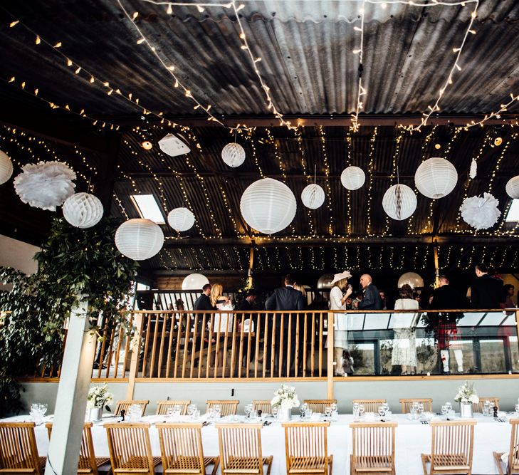 Hanging Paper Lanterns & Fairy Lights | Wedding Decor | Industrial Wedding at Cripps Stone Barn with White & Greenery Flowers | Michelle Wood Photography