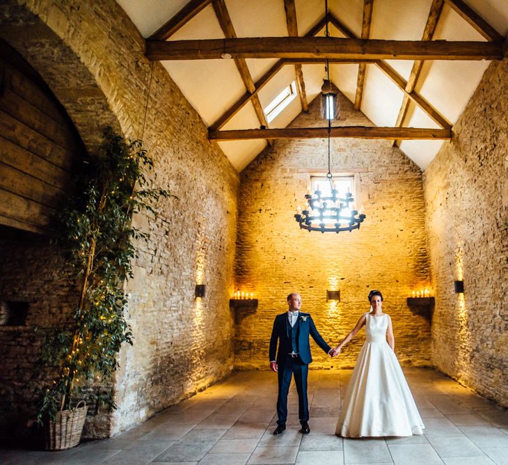 Bride in Pronovias Tami Wedding Dress | Groom in Blue Moss Bros Suit | Cripps Stone Barn Venue | Michelle Wood Photography