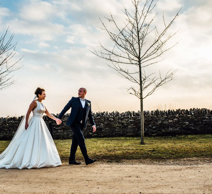 Bride in Pronovias Tami Wedding Dress | Groom in Blue Moss Bros Suit | Cripps Stone Barn Venue | Michelle Wood Photography