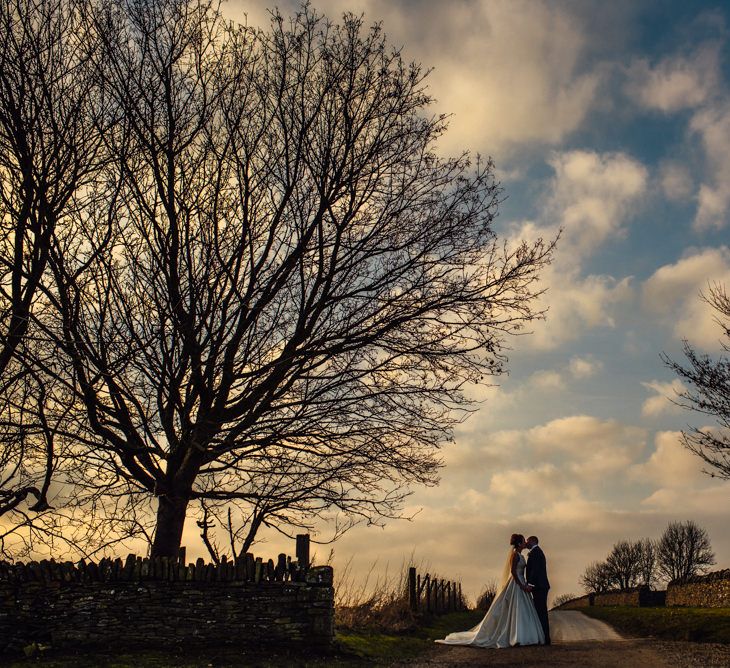 Bride in Pronovias Tami Wedding Dress | Groom in Blue Moss Bros Suit | Cripps Stone Barn Venue | Michelle Wood Photography