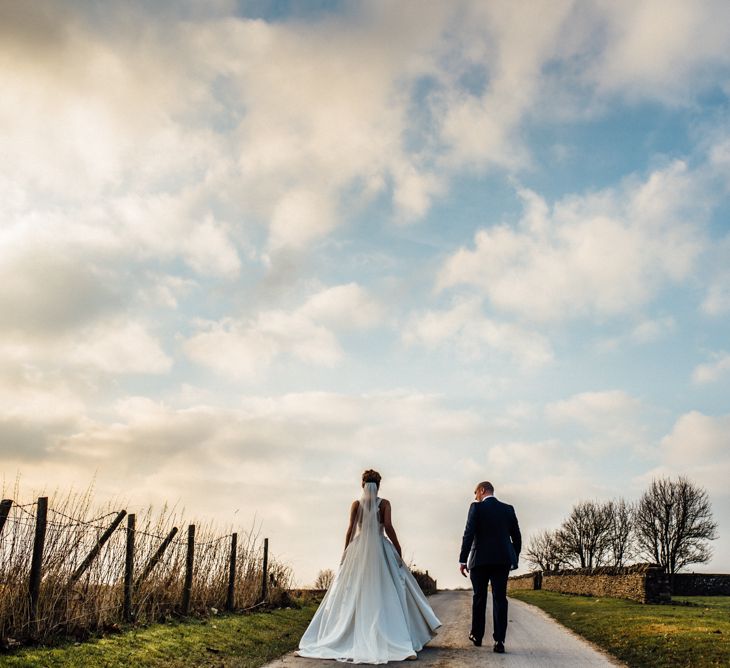 Bride in Pronovias Tami Wedding Dress | Groom in Blue Moss Bros Suit | Cripps Stone Barn Venue | Michelle Wood Photography