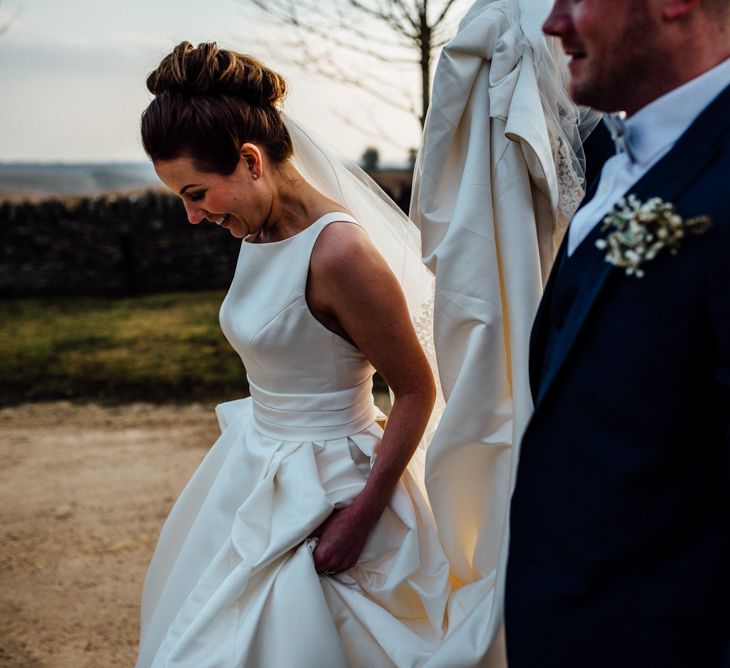 Bride in Pronovias Tami Wedding Dress | Groom in Blue Moss Bros Suit | Cripps Stone Barn Venue | Michelle Wood Photography