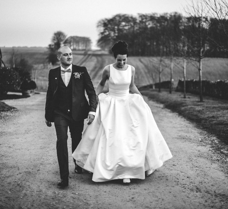 Bride in Pronovias Tami Wedding Dress | Groom in Blue Moss Bros Suit | Cripps Stone Barn Venue | Michelle Wood Photography