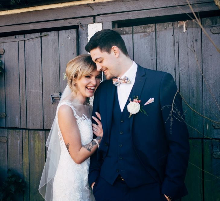 Bride in Lace Illusion Neck Wedding Dress | Groom in Next Suit | Dale Weeks Photography