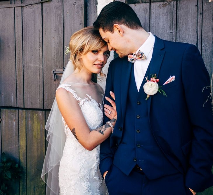 Bride in Lace Illusion Neck Wedding Dress | Groom in Next Suit | Dale Weeks Photography