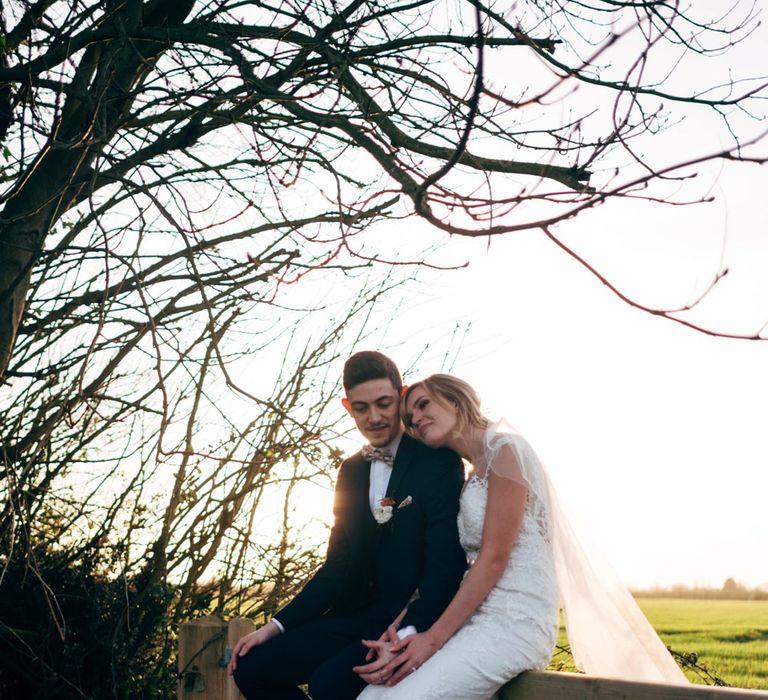 Bride in Lace Illusion Neck Wedding Dress | Groom in Next Suit | Dale Weeks Photography