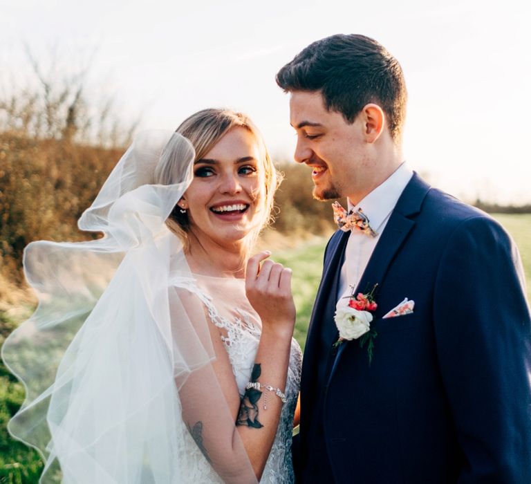 Bride in Lace Illusion Neck Wedding Dress | Groom in Next Suit | Dale Weeks Photography