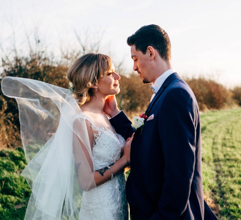 Bride in Lace Illusion Neck Wedding Dress | Groom in Next Suit | Dale Weeks Photography