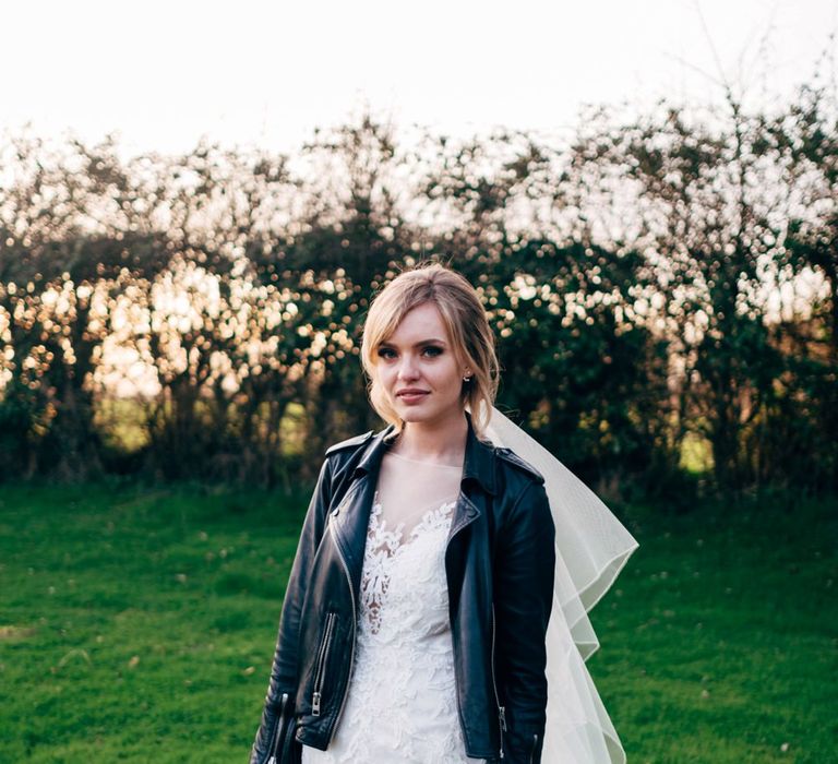 Bride in Lace Illusion Neck Wedding Dress & Leather Jacket | Dale Weeks Photography