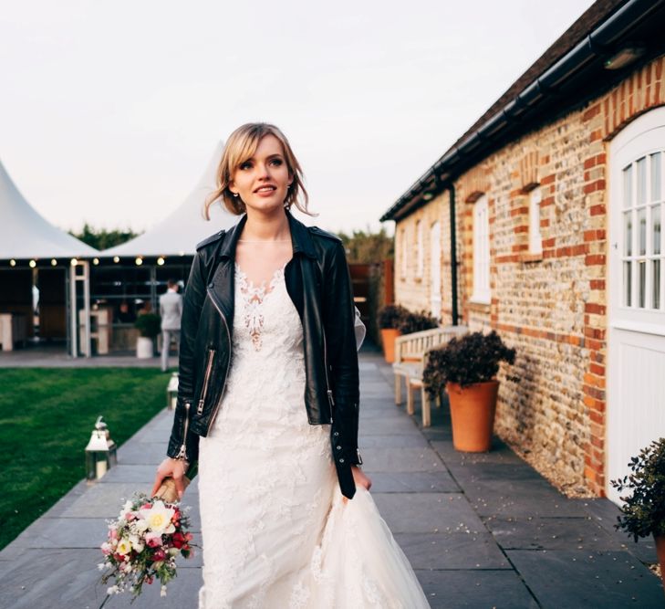 Bride in Lace Illusion Neck Wedding Dress & Leather Jacket | Dale Weeks Photography