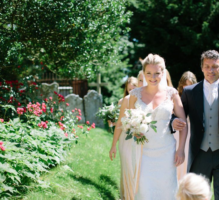 Bride in Maggie Sottero Wedding Dress