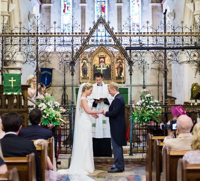 Bride in Maggie Sottero Wedding Dress Church Ceremony