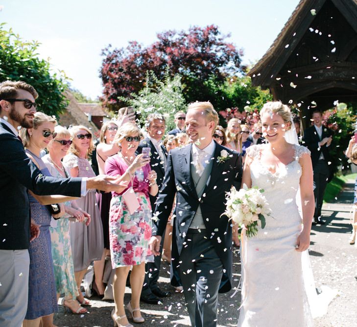 Bride in Maggie Sottero Wedding Dress Church Ceremony