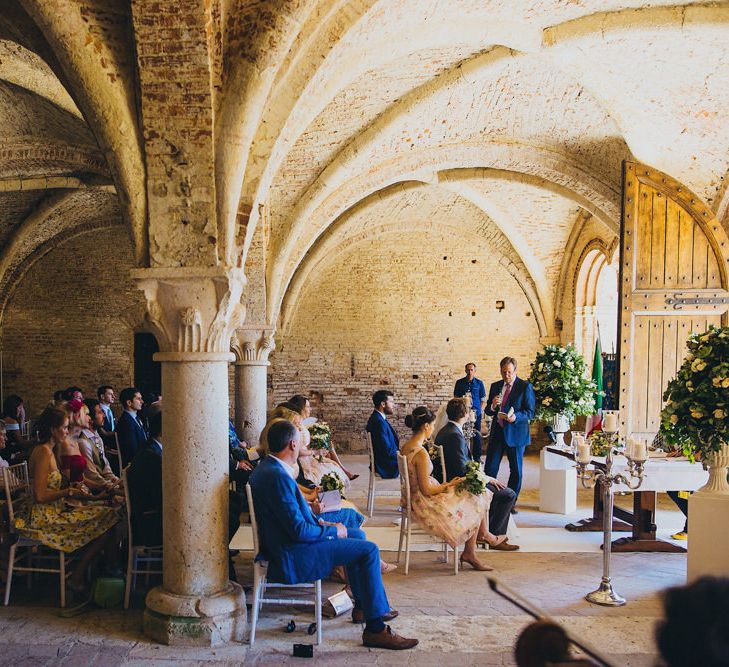 Bride in Justin Alexander Wedding Dress | Groom in Gresham Blake Suit | Outdoor Destination wedding at San Galgano Abbey, near Siena | Lush Imaging | Mrs Mash Up Films