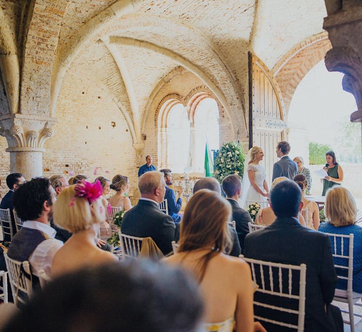 Bride in Justin Alexander Wedding Dress | Groom in Gresham Blake Suit | Outdoor Destination wedding at San Galgano Abbey, near Siena | Lush Imaging | Mrs Mash Up Films