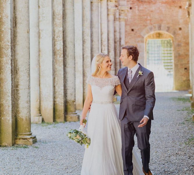 Bride in Justin Alexander Wedding Dress | Groom in Gresham Blake Suit | Outdoor Destination wedding at San Galgano Abbey, near Siena | Lush Imaging | Mrs Mash Up Films