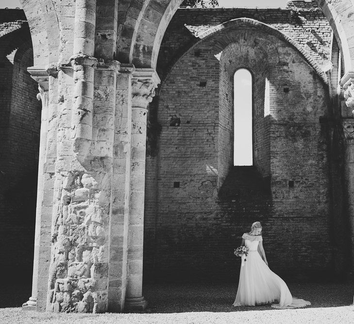 Bride in Justin Alexander Wedding Dress | Outdoor Destination wedding at San Galgano Abbey, near Siena | Lush Imaging | Mrs Mash Up Films