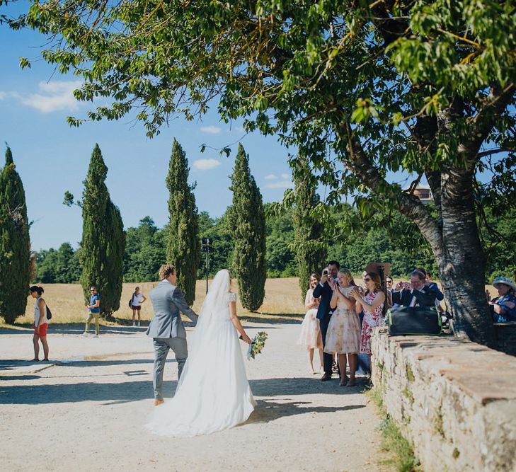 Bride in Justin Alexander Wedding Dress | Groom in Gresham Blake Suit | Outdoor Destination wedding in the Tuscan Hills at Villa Podernovo, near Siena | Lush Imaging | Mrs Mash Up Films