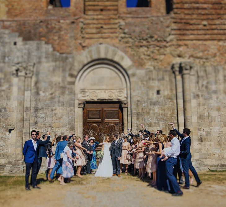 Bride in Justin Alexander Wedding Dress | Groom in Gresham Blake Suit | Outdoor Destination wedding at San Galgano Abbey, near Siena | Lush Imaging | Mrs Mash Up Films